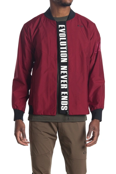 Shop Oakley Enhance Windbreaker Jacket In Raspberry