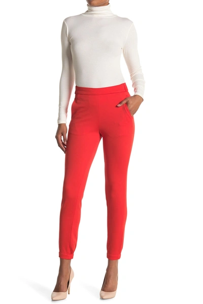 Shop Tibi Mercer Knit Joggers In Tomato Red