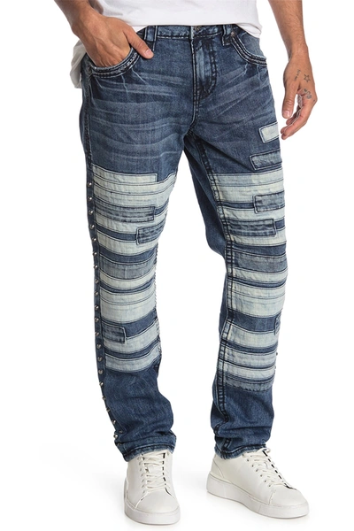 Shop Rock Revival Patchwork Tapered Leg Jeans In Med Blu