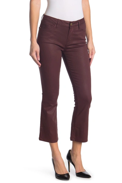 Shop Frame Le Crop Mini Bootcut Coated Jeans In Bordeaux Coated