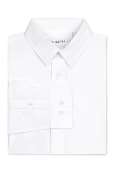 Shop Calvin Klein Kids' Solid Long Sleeve Slim Fit Shirt In 100 White