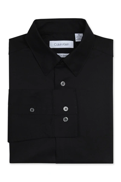 Shop Calvin Klein Kids' Solid Long Sleeve Slim Fit Shirt In 001 Black