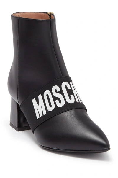 Shop Moschino Pointed Toe Ankle Bootie In Black