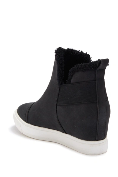 Shop Dolce Vita Kenley Suede & Faux Fur Wedge Sneaker In Black