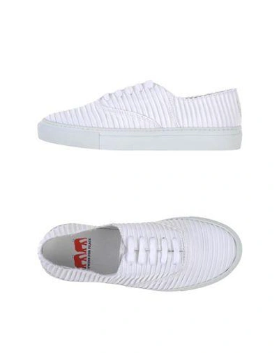 Shop Twins For Peace Sneakers In White