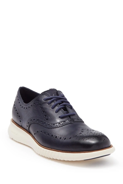 Shop Cole Haan 2.zerogrand Wingtip Brogue Oxford In Navy Leather/ivory