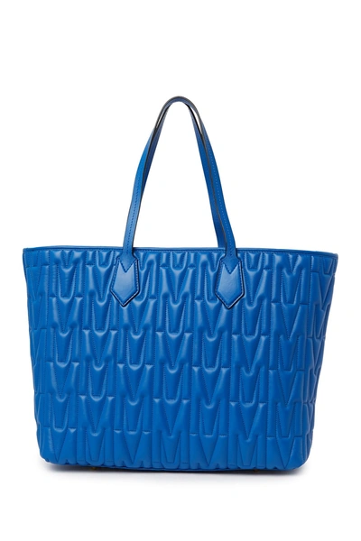 Shop Moschino Quilted Embossed Tote In Blue