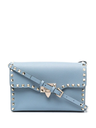 Shop Valentino Rockstud-embellished Crossbody Bag In Blue