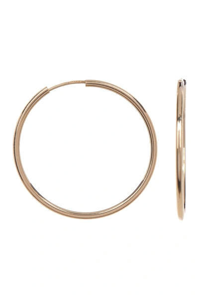 Shop Candela 14k Yellow Gold Endless 25mm Hoop Earrings