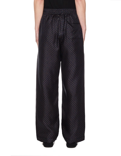 Shop Maison Margiela Silk Printed Trousers In Multicolor