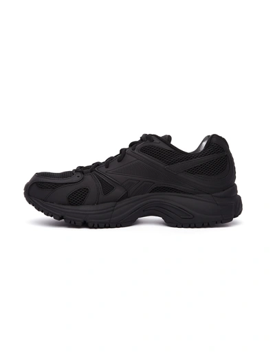 Shop Vetements Spike Runner Sneakers In Black