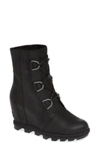 Shop Sorel Joan Of Arctic Ii Leather Waterproof Wedge Boot In Black