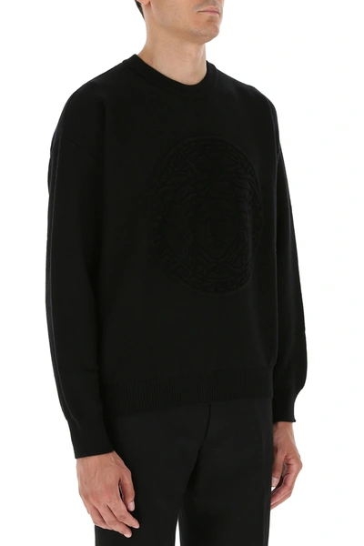Shop Versace Black Wool Sweater Black  Uomo 48