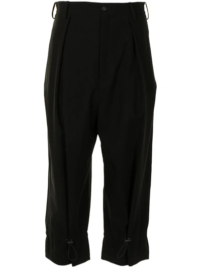 Shop Yohji Yamamoto Tapered Crop Trousers In Black