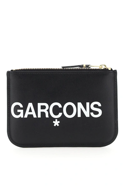 Shop Comme Des Garçons Pouch With Huge Logo In Black,white