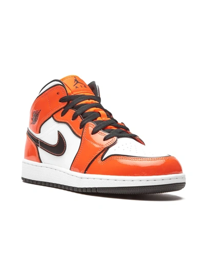 Shop Nike Air Jordan 1 Mid Se "turf Orange" Sneakers