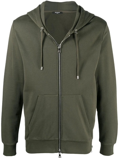 Shop Balmain Zipped Logo Embossed Hoodie In Green