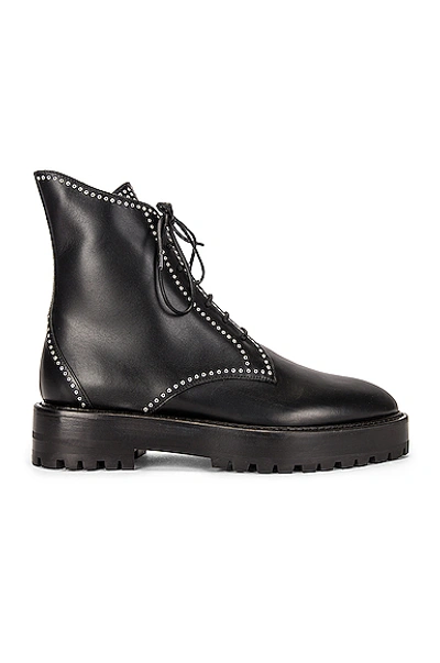 Alaïa Grommet Studded Lace-up Combat Boots In Noir