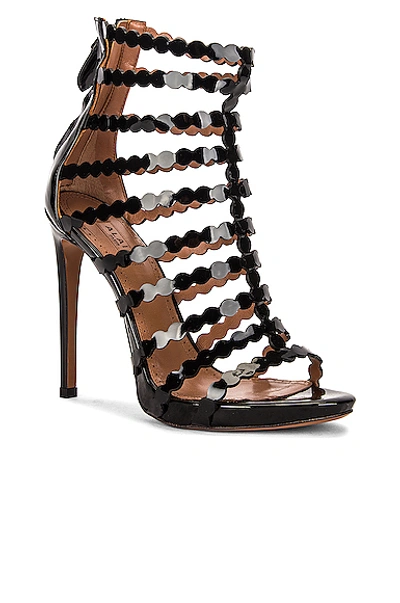 Shop Alaïa Cage Patent Leather Sandals In Noir