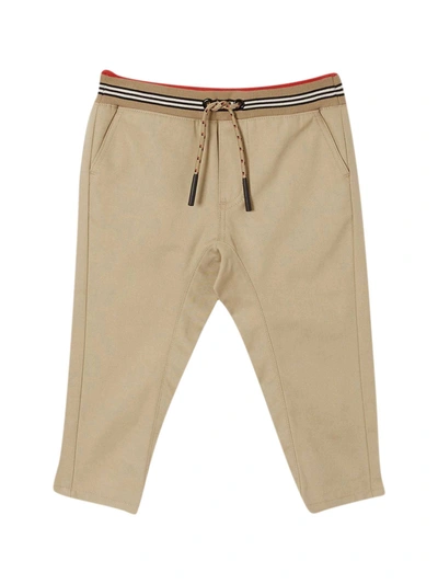 Shop Burberry Beige Trousers In Sabbia