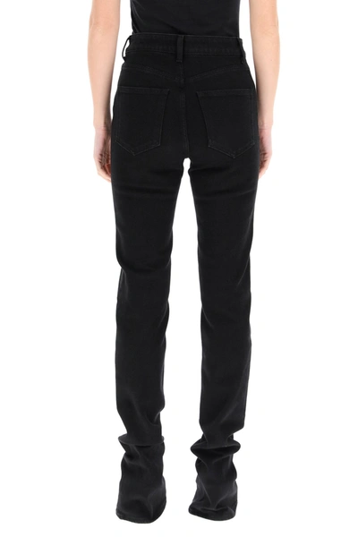 Shop Attico The  Slim Jeans With Flared Hem In Black