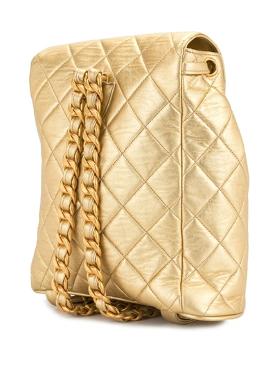 Pre-owned Chanel 菱形绗缝抽绳翻盖背包 In Gold