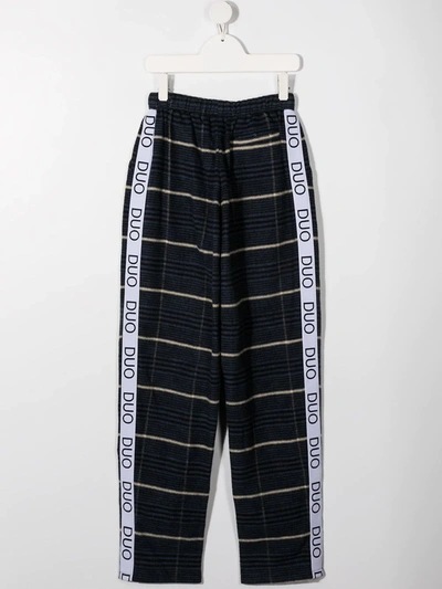 Shop Duoltd Teen Striped Track Pants With Logo Stripe Detail In Blue