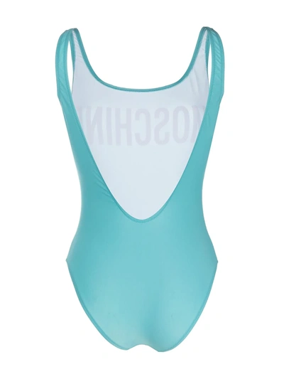 Shop Moschino Logo Print Swimsuit In Blue