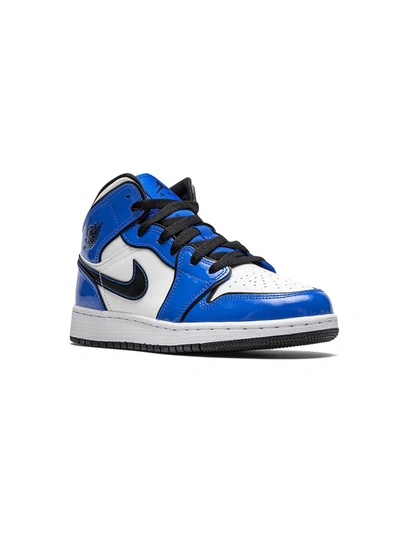 Shop Nike Air Jordan 1 Mid Se "signal Blue" Sneakers