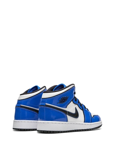 Shop Nike Air Jordan 1 Mid Se "signal Blue" Sneakers