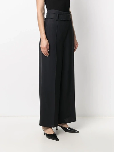 Shop Aeron High-rise Belted Trousers In Black