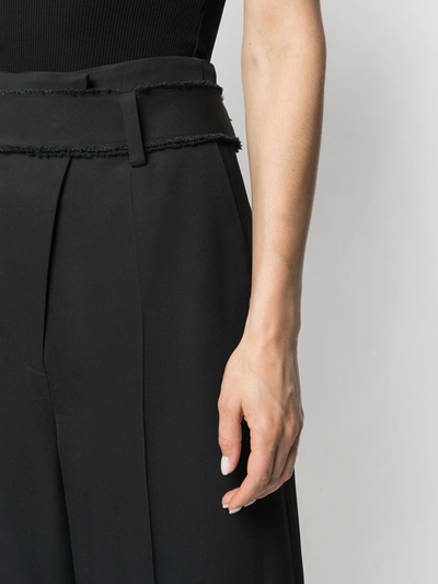 Shop Aeron High-rise Belted Trousers In Black