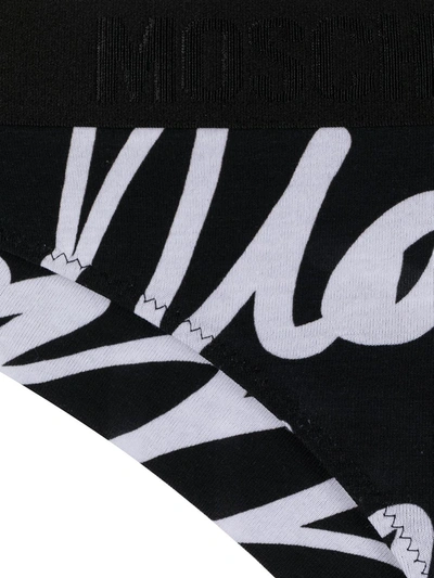 Shop Moschino Low-rise Logo-print Briefs In Black