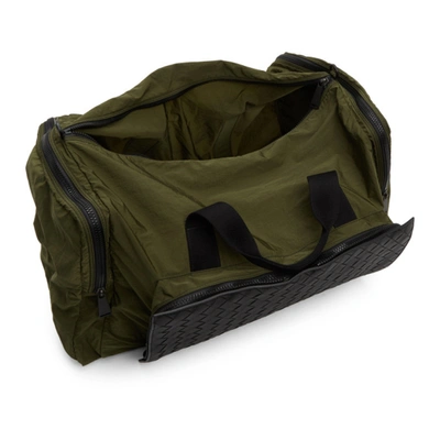 Shop Bottega Veneta Green Intrecciato Packable Duffle Bag In 3250 Kakine