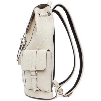 Shop Gucci Off-white Gg Embossed Backpack In 9099 M.whit