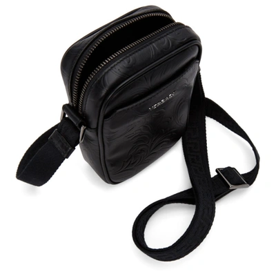 Shop Versace Black Embossed Barocco Crossbody Bag In D41e Black