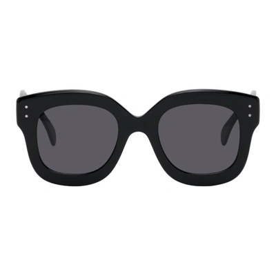Shop Alaïa Black Oversized Sunglasses In 001 Black
