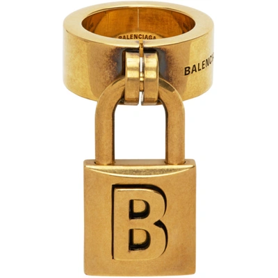 Shop Balenciaga Gold Lock Ring In 0604 Antgld