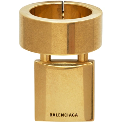 Shop Balenciaga Gold Lock Ring In 0604 Antgld