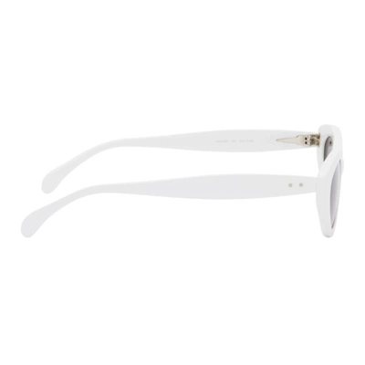 Shop Alaïa Alaia White Slim Cat Eye Sunglasses In 002 White