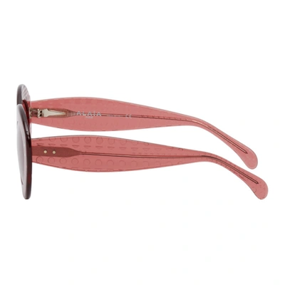Shop Alaïa Pink Oversized Cat Eye Sunglasses In 006 Pink