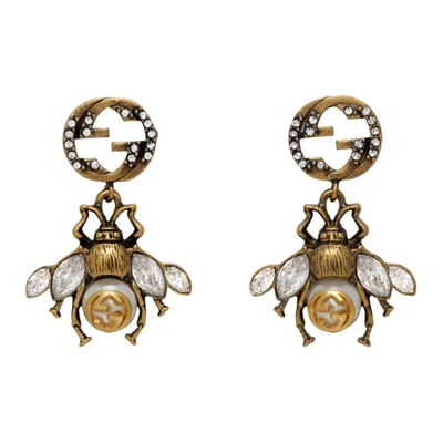 Shop Gucci Gold Interlocking G Bee Earrings In 8516 Gold