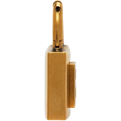 Shop Balenciaga Gold Small Lock Earrings In 0604 Antgld