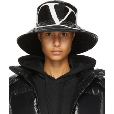 Shop Valentino Black  Garavani Shiny Vlogo Bucket Hat In 0ni Black/w