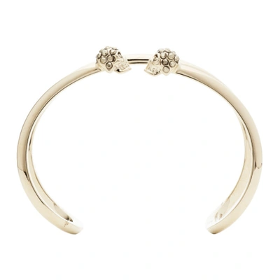 Shop Alexander Mcqueen Gold Thin Double Skull Bracelet In 7285 0953