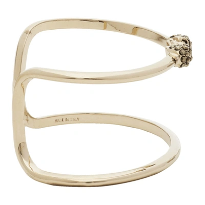 Shop Alexander Mcqueen Gold Thin Double Skull Bracelet In 7285 0953