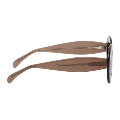 Shop Alaïa Brown Oversized Cat Eye Sunglasses In 003 Brown