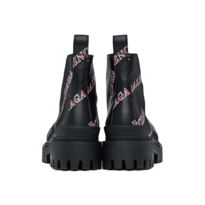 Shop Balenciaga Black And Red Allover Logo Strike Boots In 1060black/