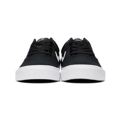 Shop Nike Black & White Sb Charge Slr Sneakers In 002 Black/w