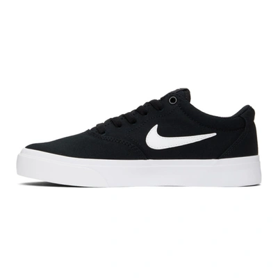 Shop Nike Black & White Sb Charge Slr Sneakers In 002 Black/w